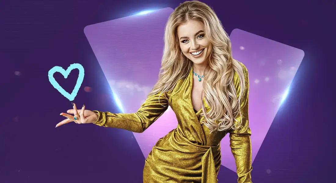 Testimonial di Naobet Casino in abito dorato con un cuore luminoso per il bonus di benvenuto Testimonial di Naobet Casino in abito dorato con un cuore luminoso per il bonus di benvenuto